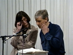 Alice Notley and Douglas Oliver, still from Poetry Center Archive video, April 25, 1991, at the Eye Gallery, San Francisco